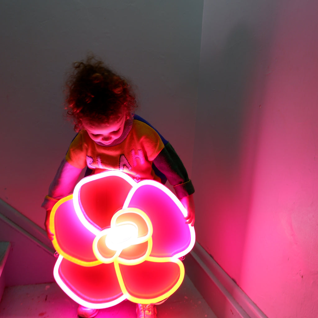 Bloomin' LED Neon sign in material girl, clementine, pretty pink, and stop sign.